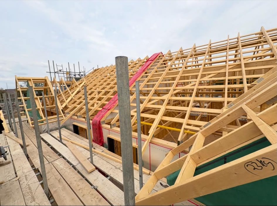 Hand-cut rafters and ridge on a pitched roof