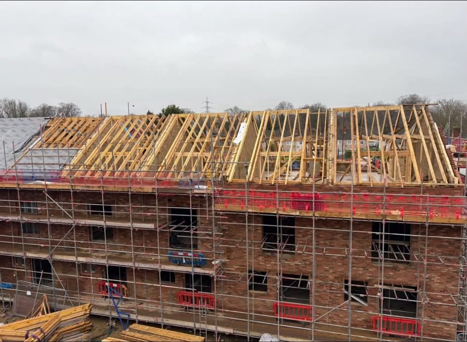 Roof trusses craned onto a new build block