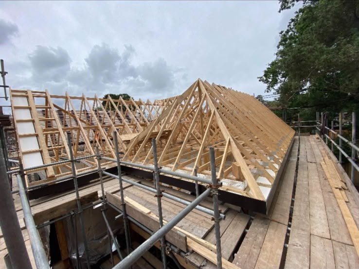 Timber truss roof structures erected on site